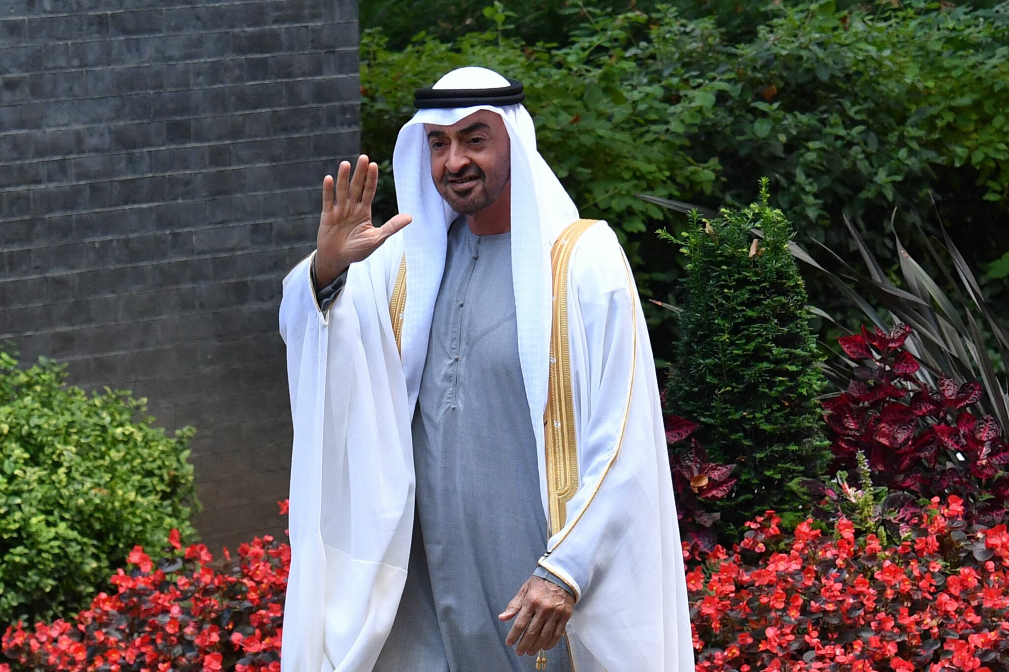 BRITAIN-UAE-DIPLOMACY Crown Prince of Abu Dhabi, Mohamed bin Zayed Al Nahyan gestures as he arrives for a meeting with Britain's Prime Minister Boris Johnson at number 10, Downing Street in central London, on September 16, 2021. (Photo by JUSTIN TALLIS / AFP)
