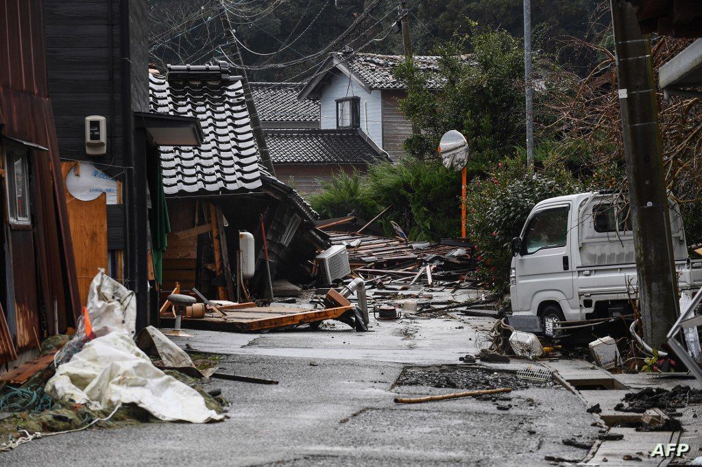 This picture shows damaged homes in the town of Misaki in Suzu city, Ishikawa prefecture on January 7, 2024, after a major 7.5 magnitude earthquake struck the Noto region on New Year's Day. (Photo by Toshifumi KITAMURA / AFP)