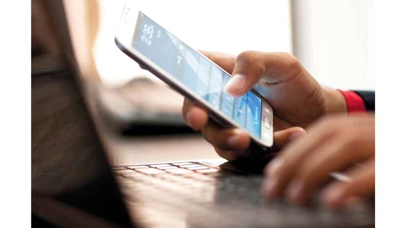 Businessman using smart phone